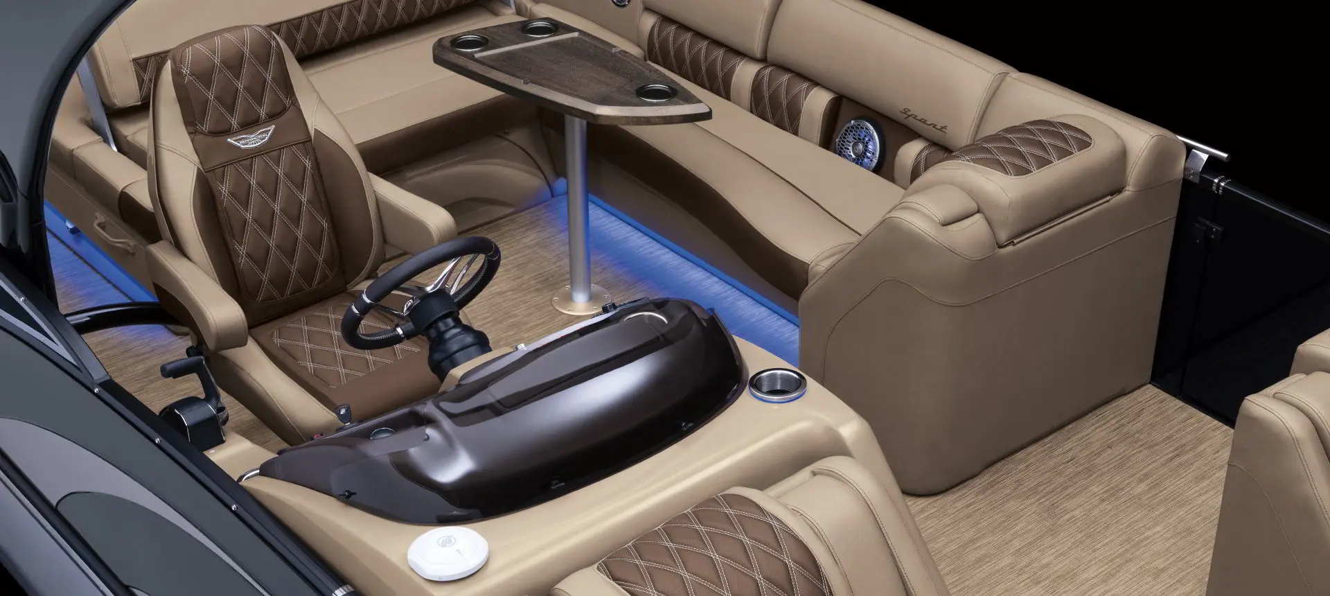 the helm and l-bench seat on a Bennington QX pontoon boat