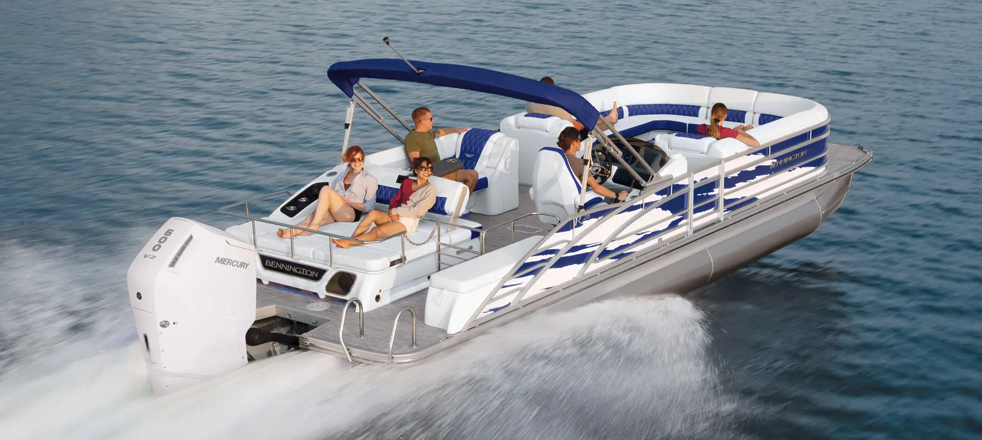 group of friends cruising the lake on a Bennington R pontoon