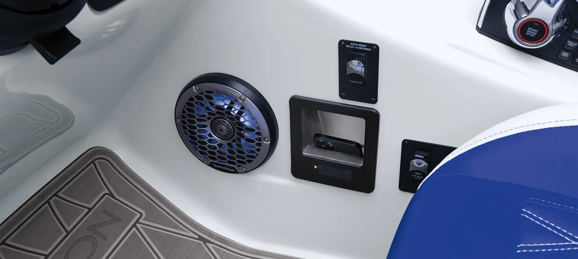 speaker and phone charger/holder on a Bennington R pontoon