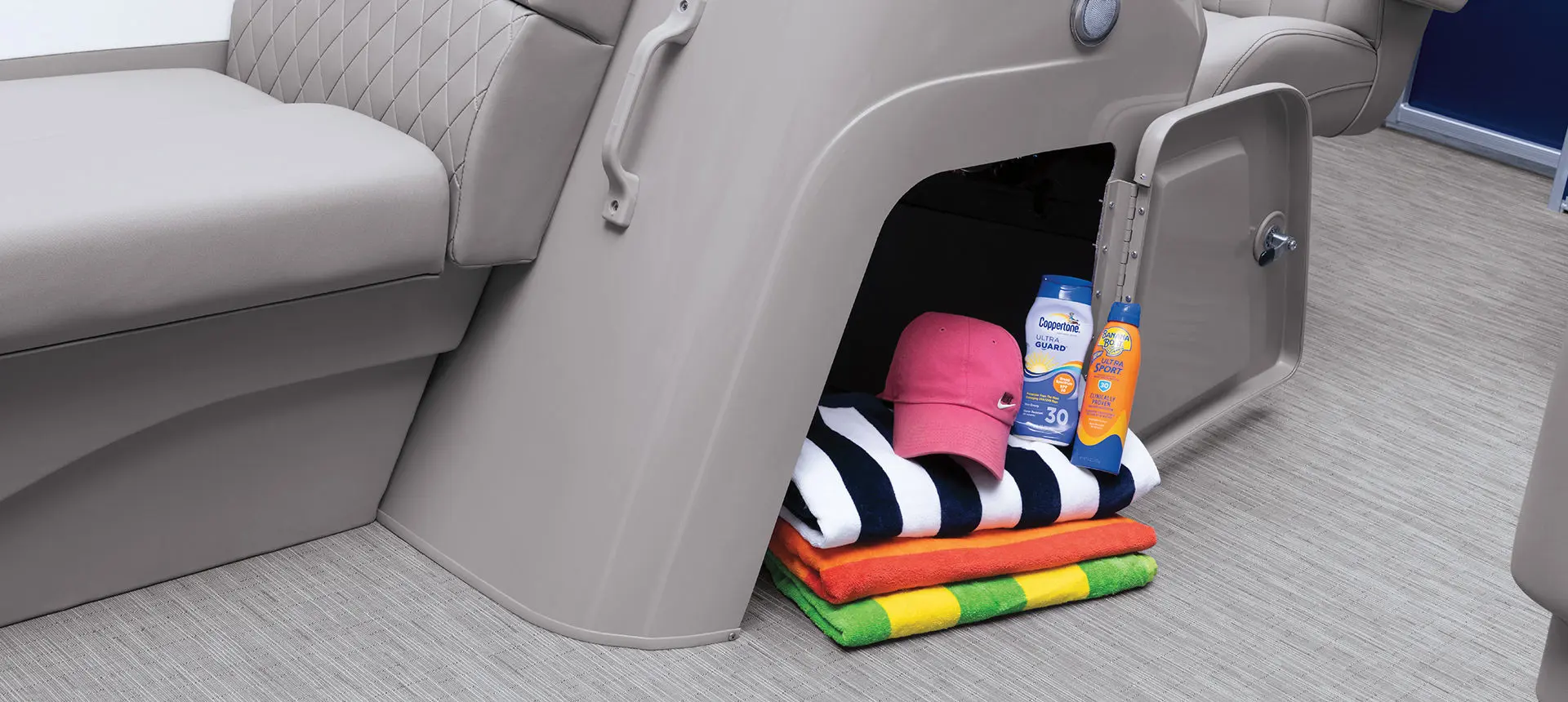 integrated storage under the helm of a Bennington SV pontoon boat