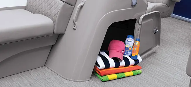 integrated storage under the helm of a Bennington SV pontoon boat