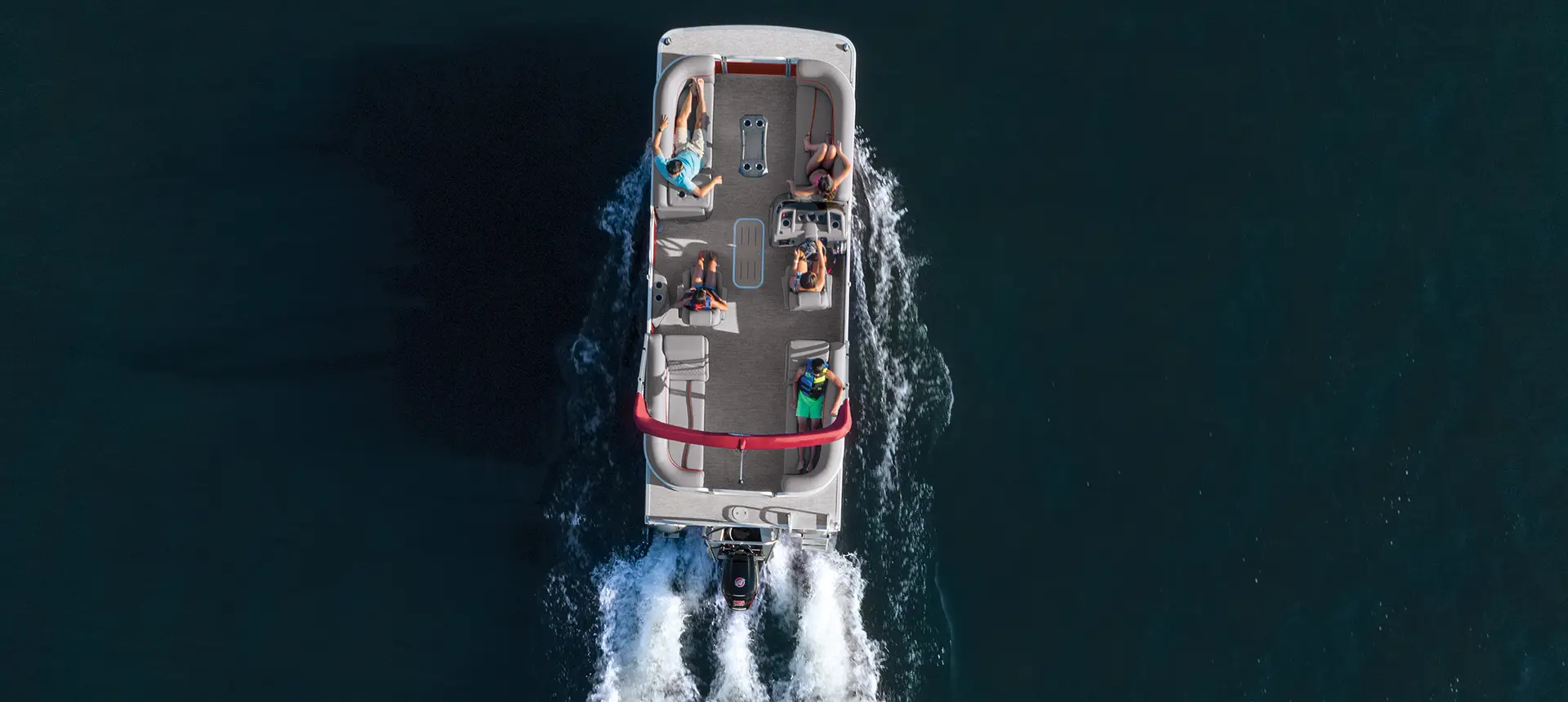 aerial view of a Bennington SV pontoon boat cruising on a lake
