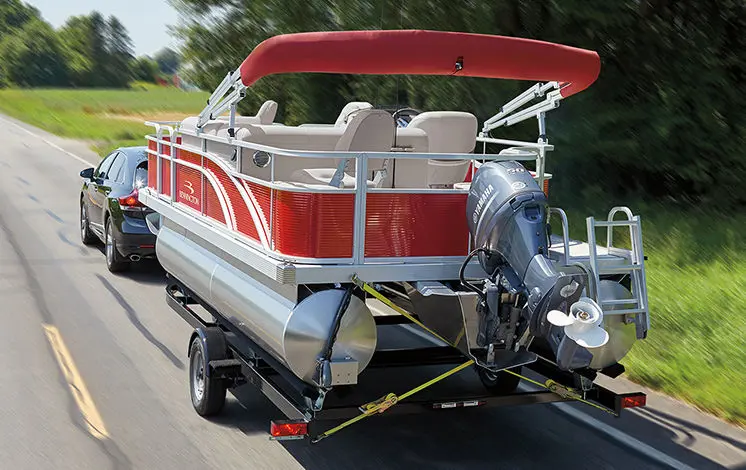Bennington SV pontoon boat pulled behind a vehicle