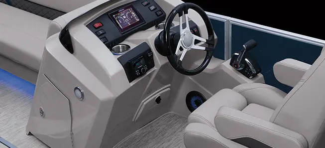 steering wheel and captain's chair at the helm of a bennington sx pontoon boat