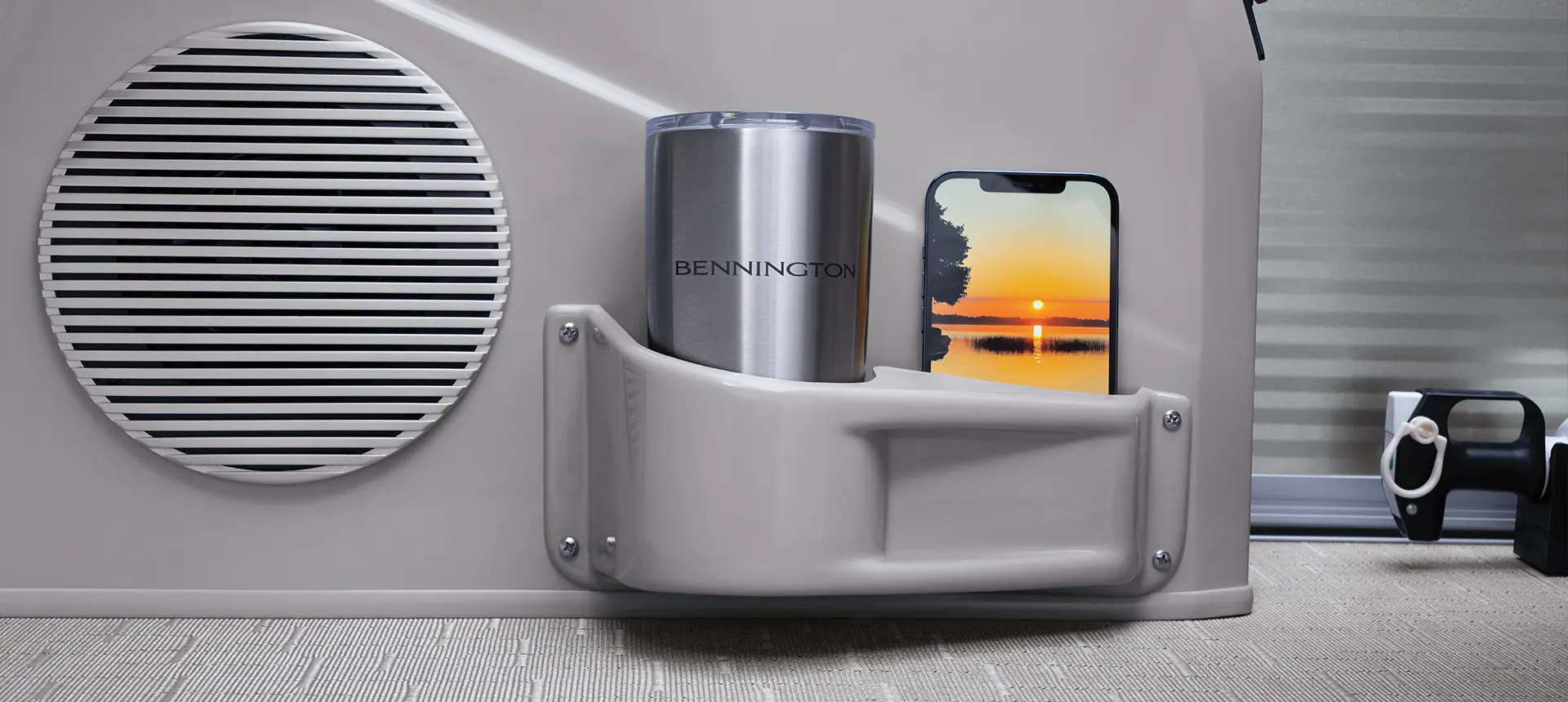 cup and phone holder on a bennington sx pontoon boat