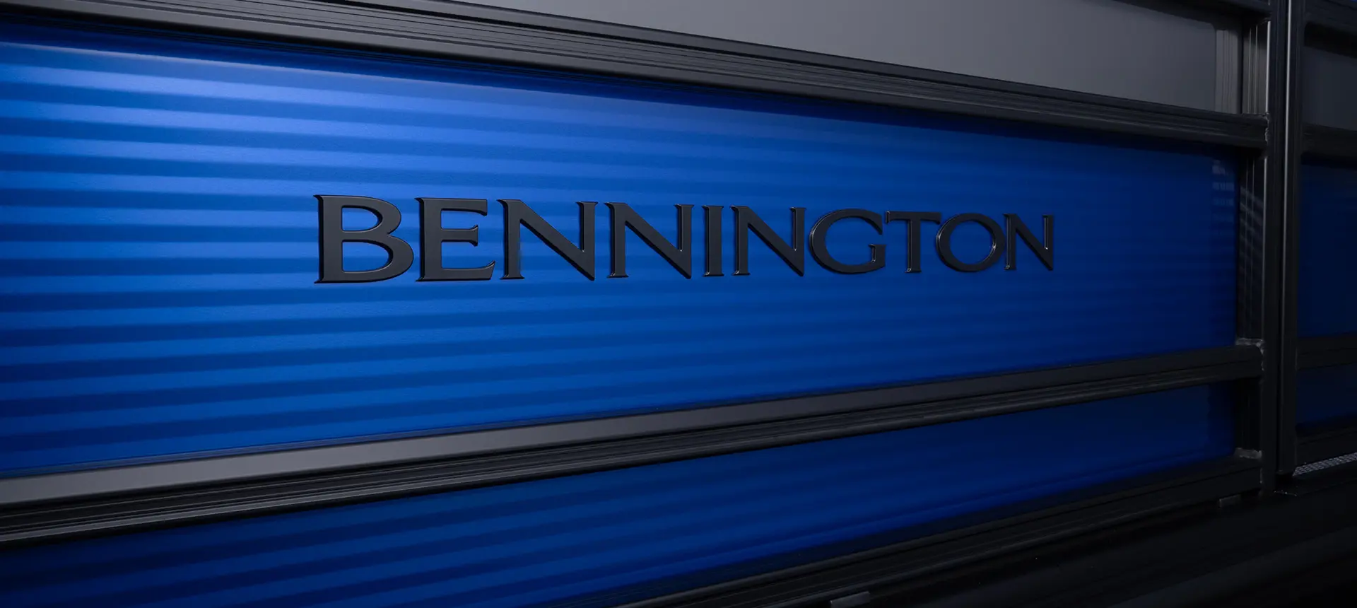 logo on the side panels of a bennington s series pontoon