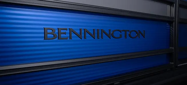 logo on the side panels of a bennington s series pontoon