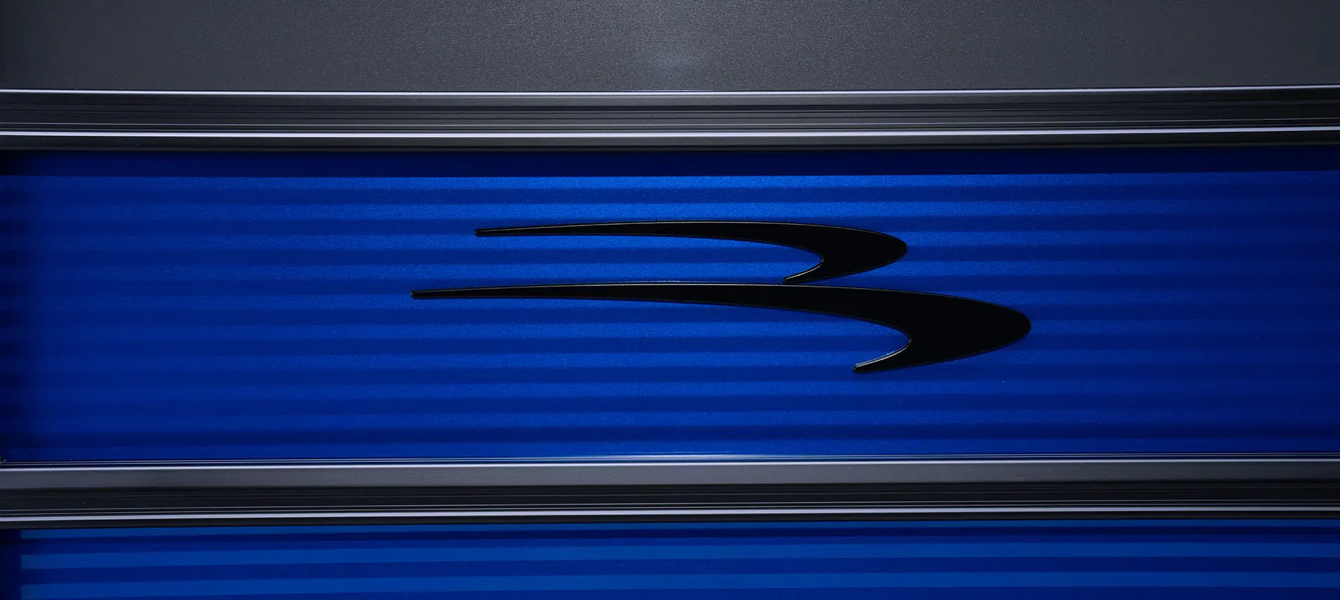 logo on the paneling of a bennington s series pontoon