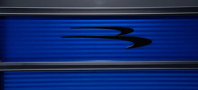 logo on the paneling of a bennington s series pontoon