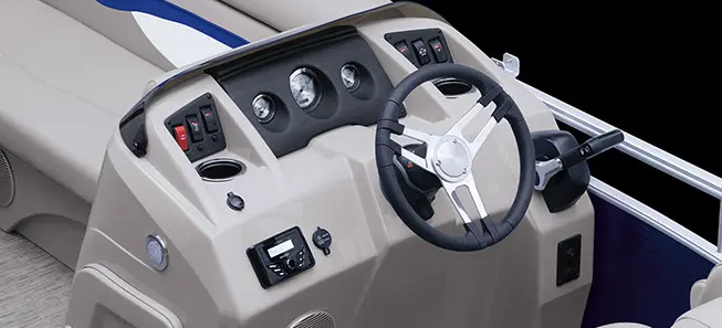 steering wheel and gauges on the helm of a Bennington SV pontoon boat