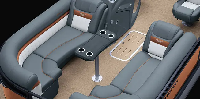 Aerial view of the bow quad bench seating and bow table on a Bennington LX Sport pontoon boat.