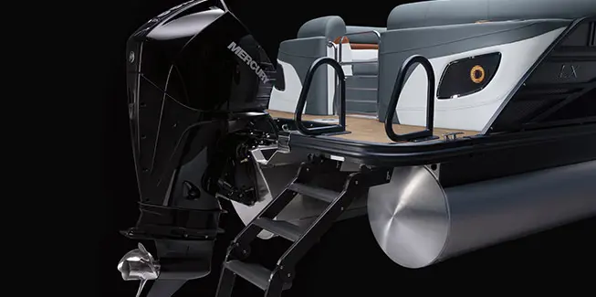 Stern ladder and engine on a Bennington LX Sport pontoon boat.