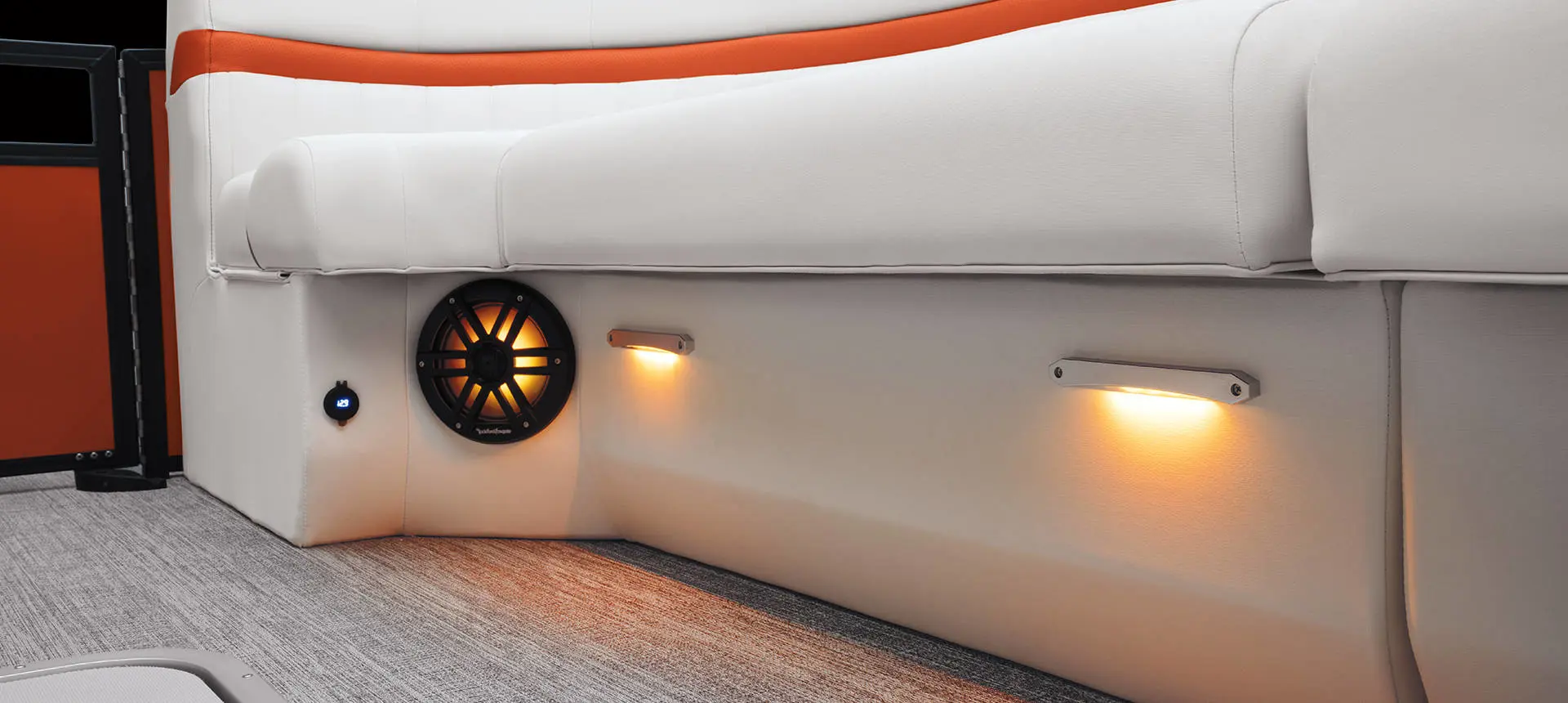 Aerial view of the bow quad bench seating and bow table on a Bennington LX Sport pontoon boat.