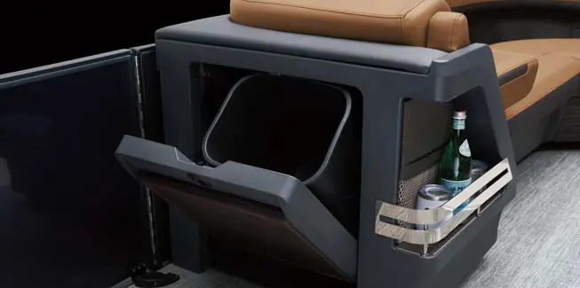 Integrated garbage storage on a Bennington M Line pontoon boat.