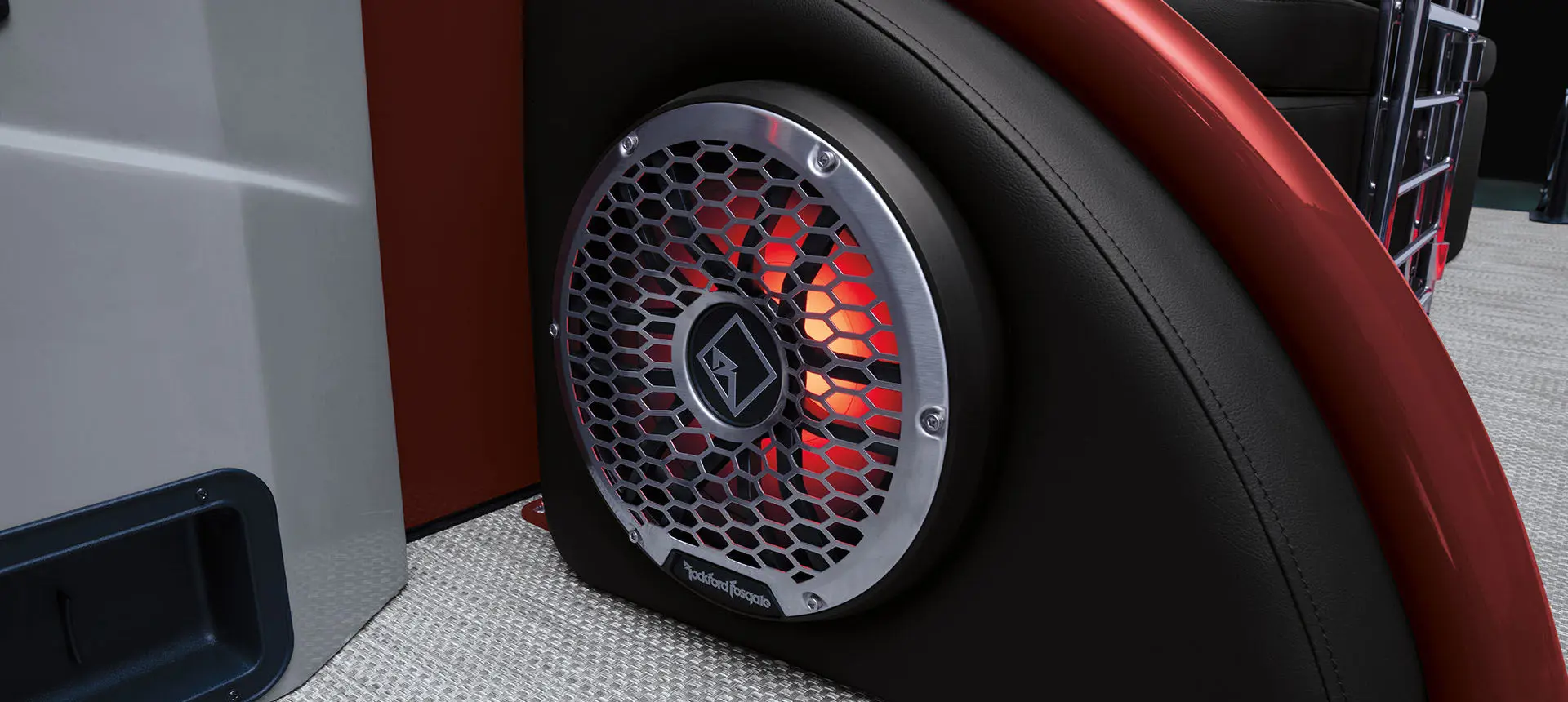 Integrated Rockford Fosgate audio speakers on a Bennington QX Line pontoon boat.