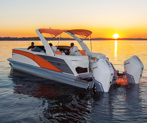 Twin engines on the stern of a Bennington RX Sport pontoon boat.