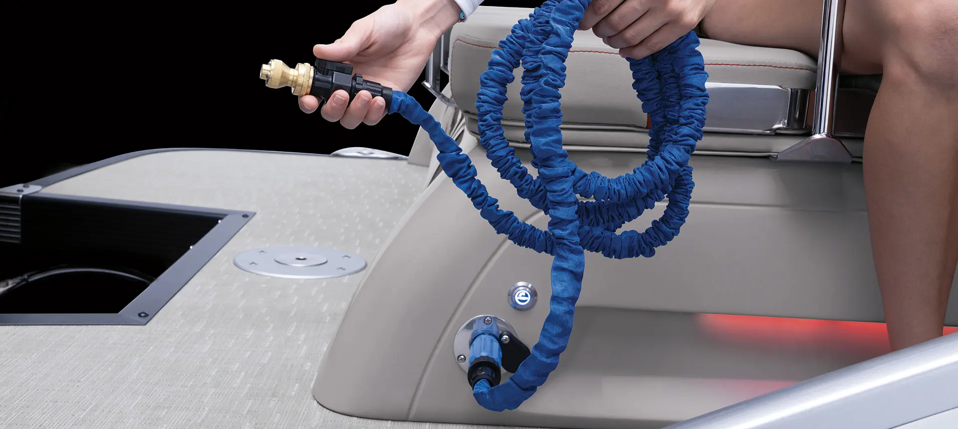 Washdown hose on a Bennington RX Sport pontoon boat.
