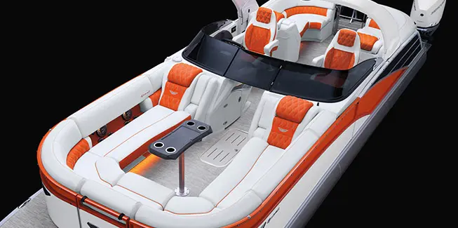 Aerial view of the bow seating and bow table on a Bennington RX Sport pontoon boat with Quad Bench layout.