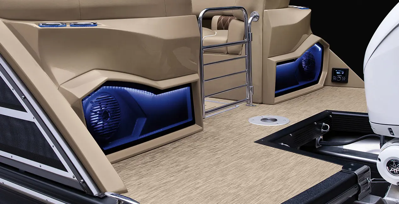 Integrated speakers on the stern with RGB lighting on a Bennington RX Sport pontoon boat.
