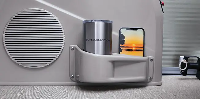 Integrated cup & phone holder on a Bennington SX Line pontoon boat.