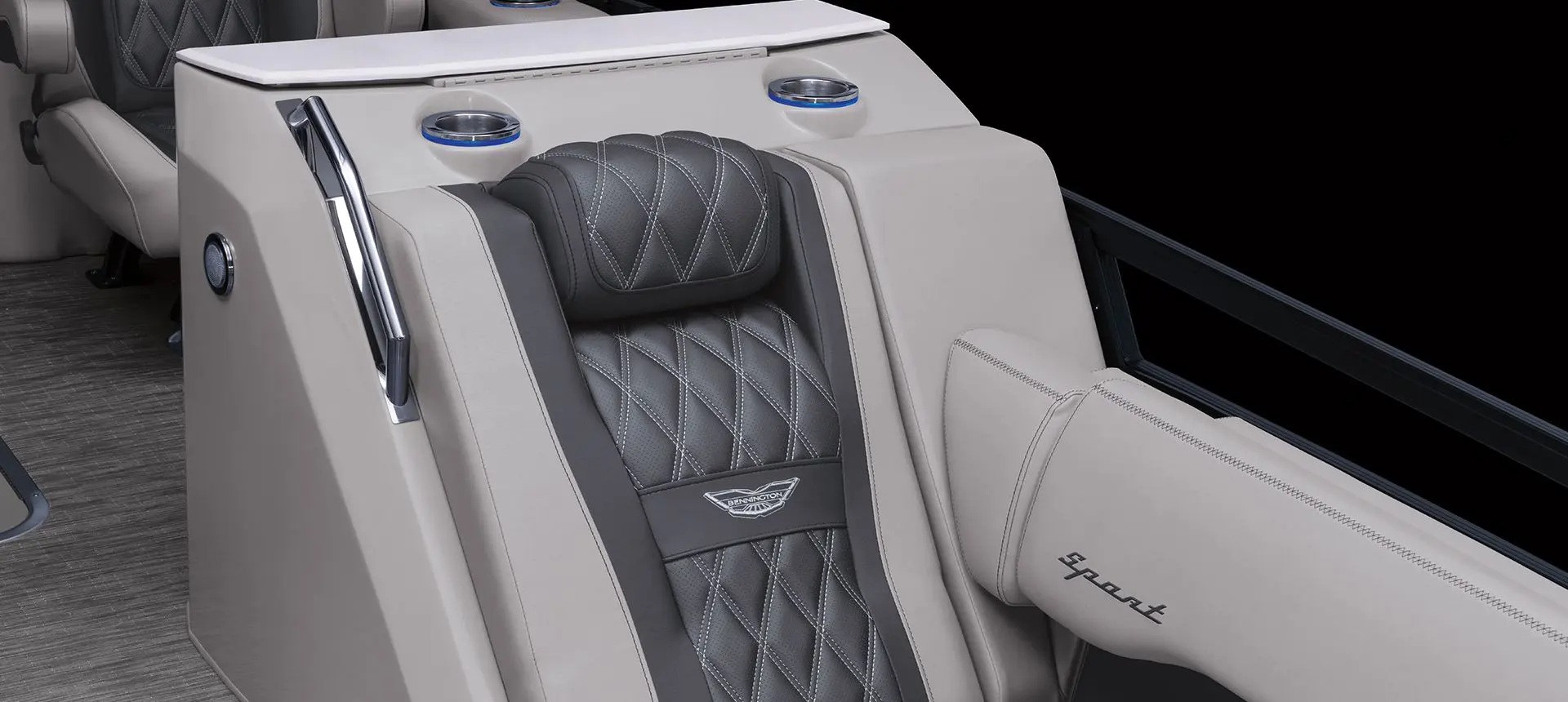 Closeup of the luxury seat and premium stitching on the step-down U-Lounge on a Bennington Bowrider pontoon boat.