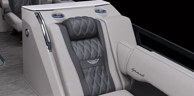 Closeup of the luxury seat and premium stitching on the step-down U-Lounge on a Bennington Bowrider pontoon boat.