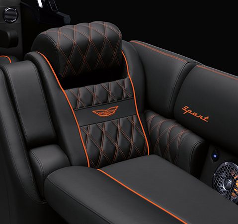 Body formed cushions with premium materials on a Bennington pontoon boat. 