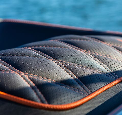 Detailed embroidery on Bennington pontoon and tritoon boat seating. 
