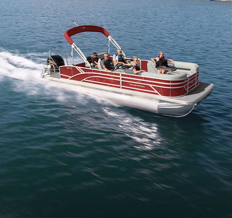 Bennington S Series pontoon cruising on a lake.