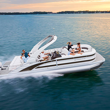 group of friends hanging out on a pontoon boat