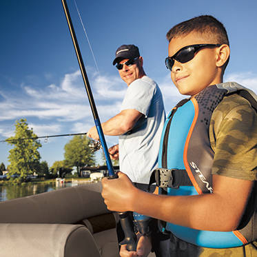 kids fishing off of Bennington pontoons