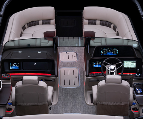 Aerial view of the dual helms with panoramic windshields on a Bennington QX line pontoon boat.