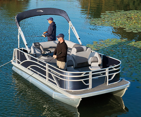 Overhead view of 2 men fishing off the side if a Bennington S One Pontoon Boat. 