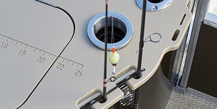 Close-up of fishing pole storage