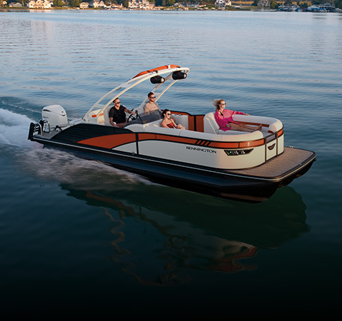 Overhead view of friends cruising the lake on a Bennington pontoon. 