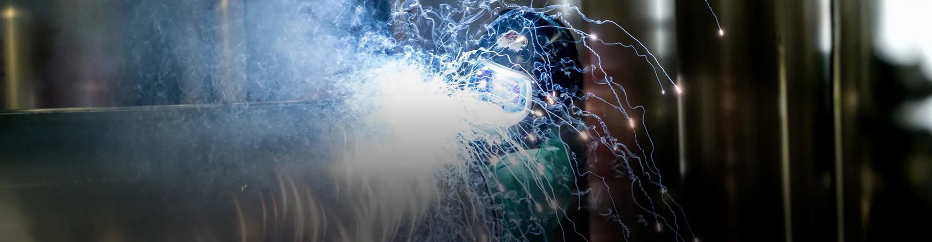 Flying sparks from welding machine in a Bennington Factory. 