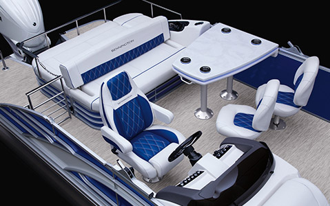 A whole family relaxing on their Bennington Pontoon Boat.