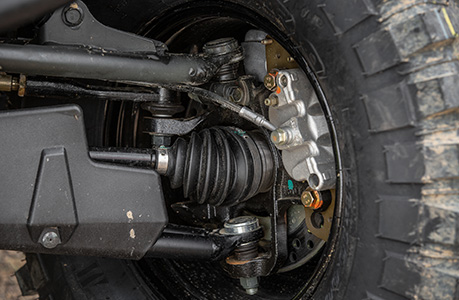 Reinforced driveline components on a Polaris Pro XD work UTV for construction jobsites.