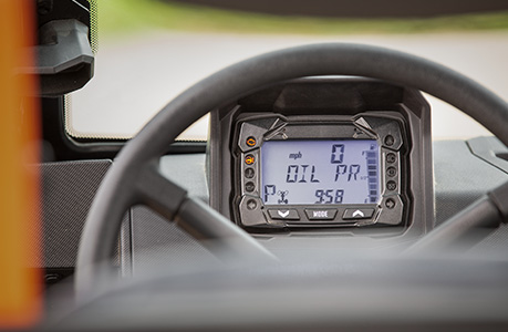 Digital gauge showcasing operator warnings on a Polaris Pro XD work UTV.