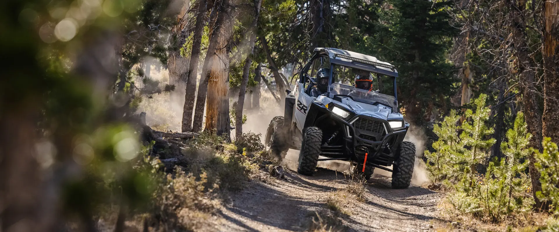 RZR Trail S taking a trail road