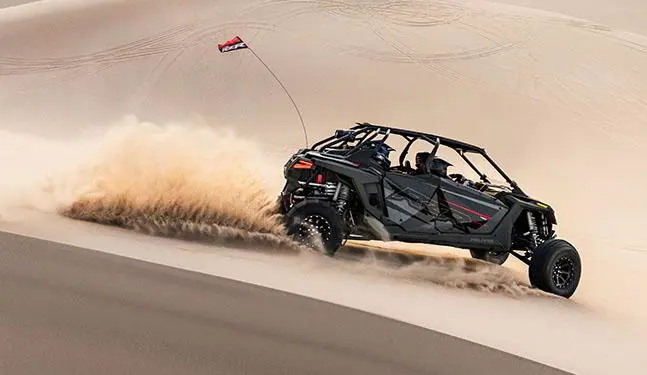 RZR TURBO R going down the hill through sand