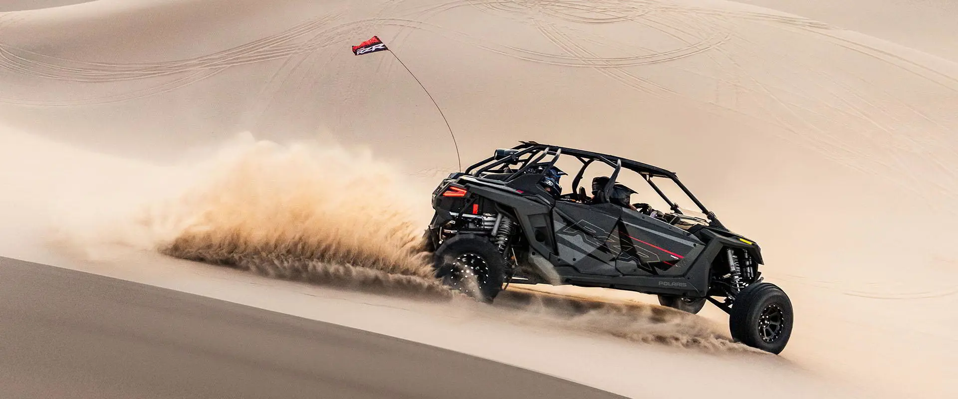 RZR TURBO R going down the hill through sand