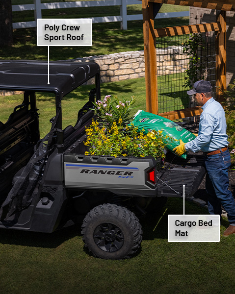 Poly crew sport roof and cargo bed mat accessories from the Landowner Package installed on a 2024 Polaris RANGER SP 570 UTV.