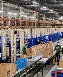 Employees working at a Polaris warehouse
