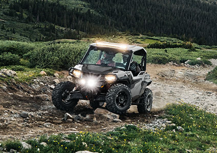 Polaris GENERAL XP 1000 driving with Pro Armor headlights on