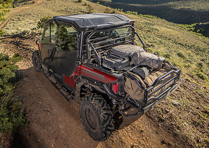 Rhino-Rack storage options and rear panels in the cargo box of a GENERAL 4 XP 1000