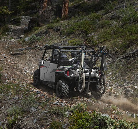 2025 GENERAL 4 1000 soaking up bumps with its 12.25-inch front suspension travel and 13.2-inch rear suspension travel.