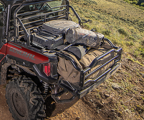 Closeup of a General´s rear bed with a bed extender, filled with cargo