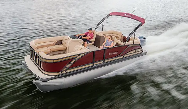 godfrey monaco split bench pontoon speeding through a lake