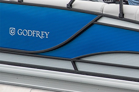 Rail skins with fluted design on a godfrey pontoon